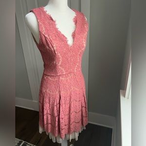 Mauve lace dress with cream lining. Deep V in front and back. Only worn once.